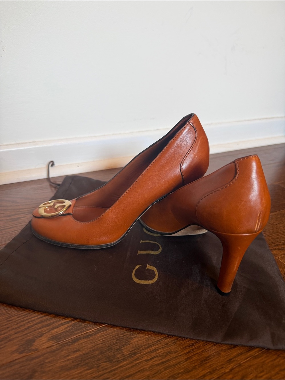 Gucci Tan Leather Pumps with Gold GG Medallion